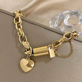 Pulseira de coração em ouro