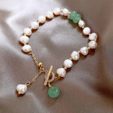 Pulseira vintage com pérolas e pedras preciosas verdes douradas