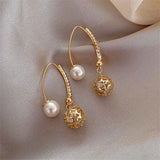 Brincos vintage em ouro e pérolas